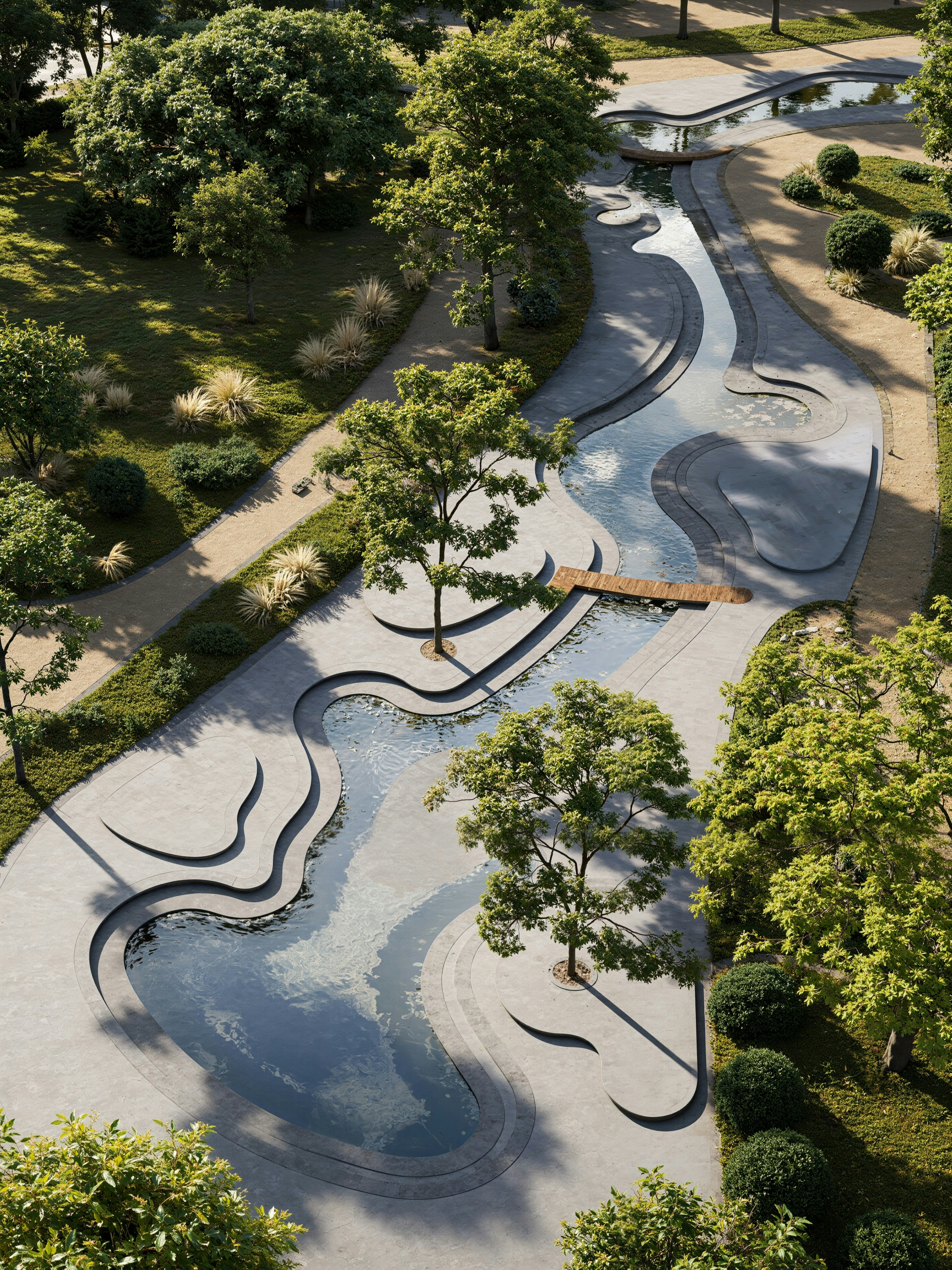 Aerial view of trees and winding fountain